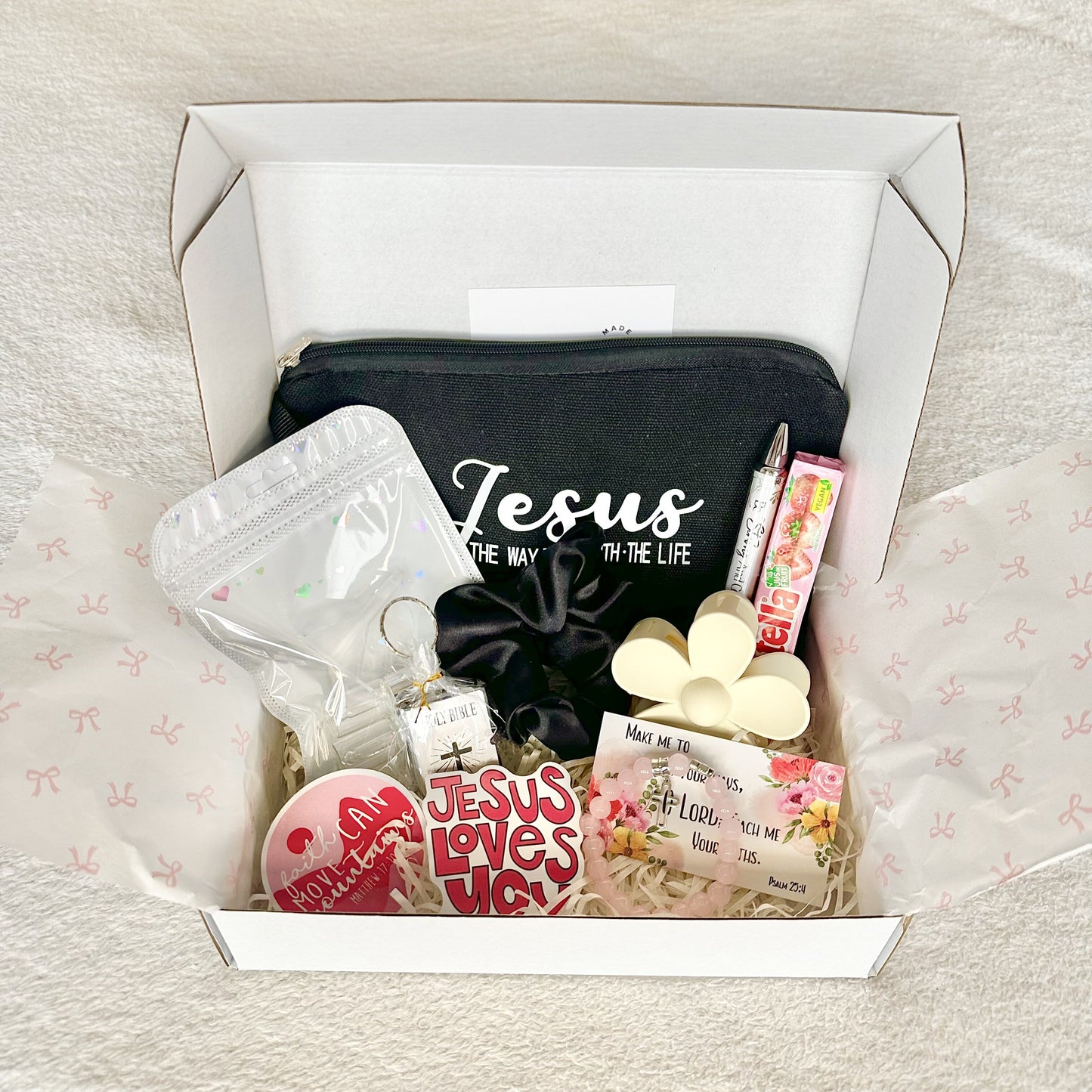a christian gift box with a cross bracelet