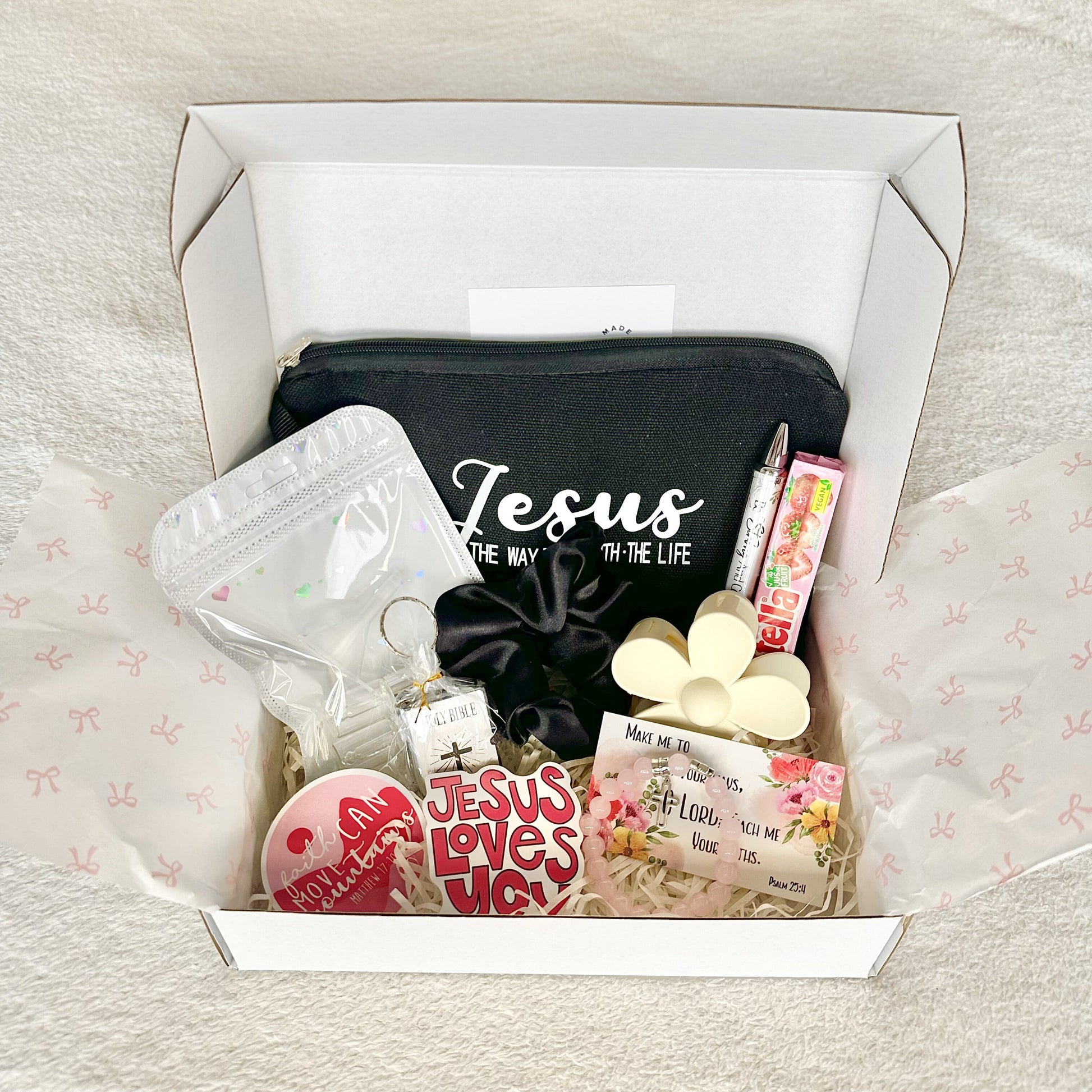 a christian gift box with a cross bracelet