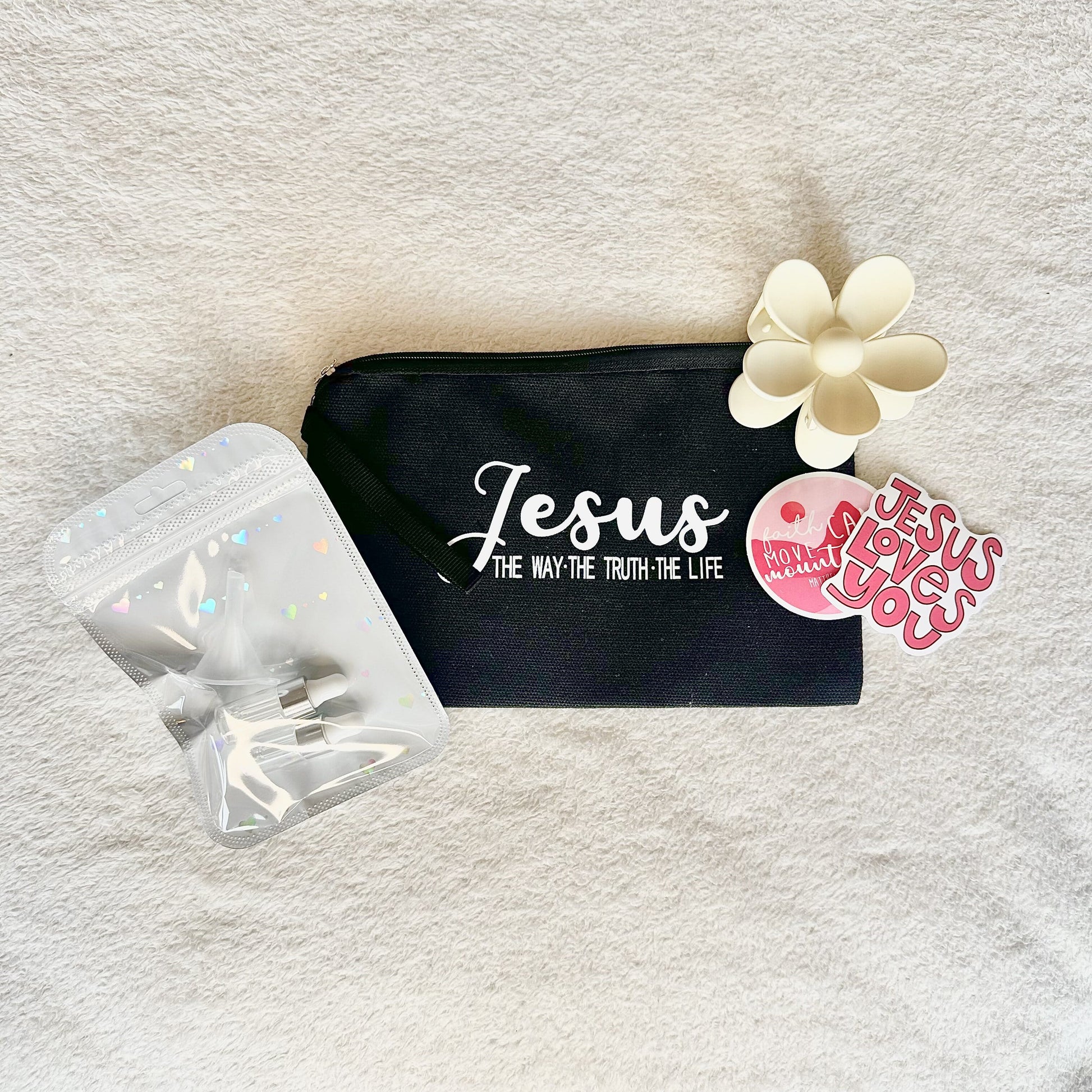faith based christian make-up bag with flower hair clip & anointing oil bottles