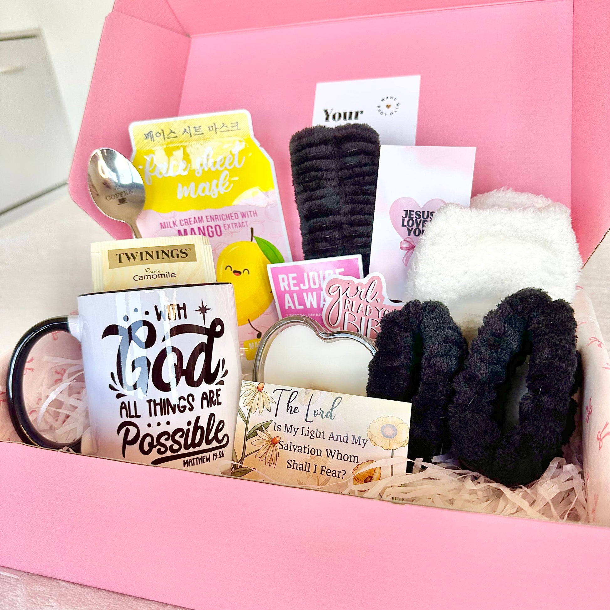 A big christian faith based gift box filled with self care and beauty items