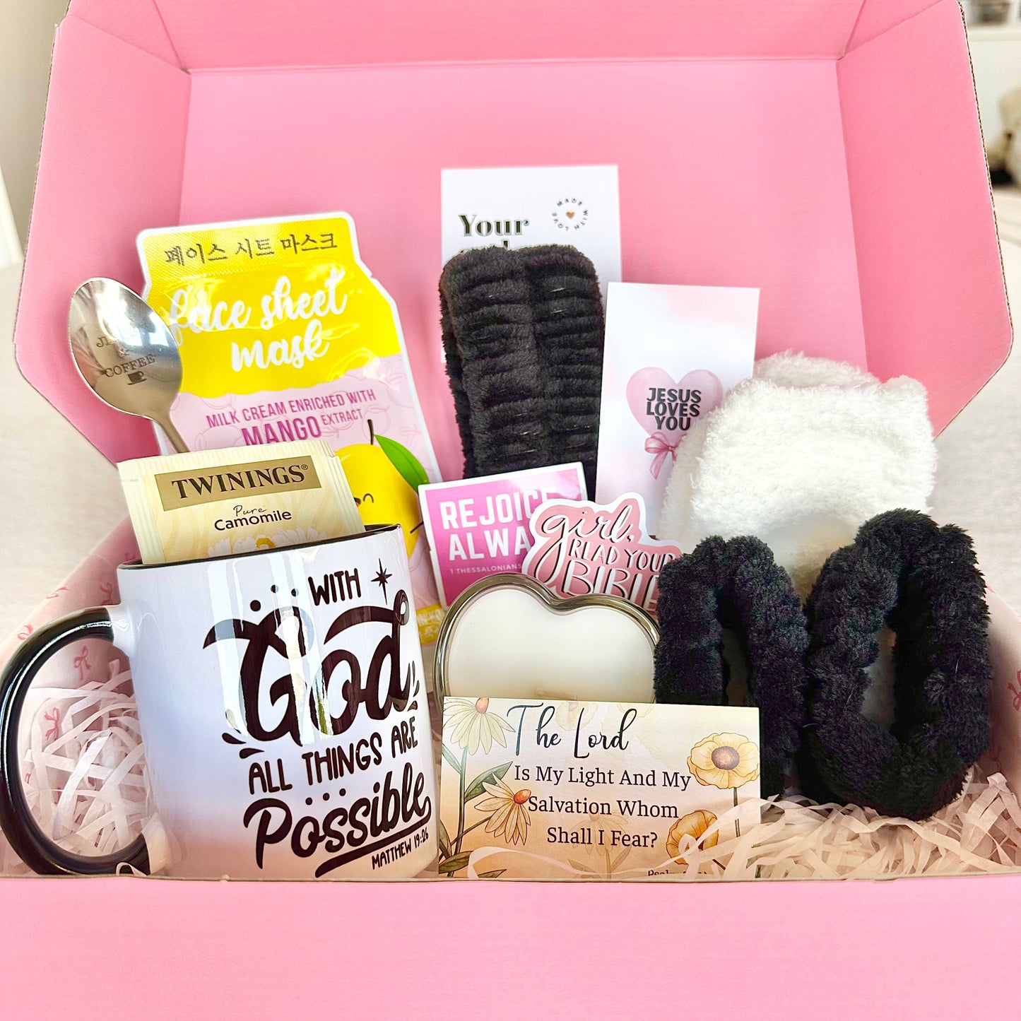 A big christian faith based gift box filled with self care and beauty items for woman